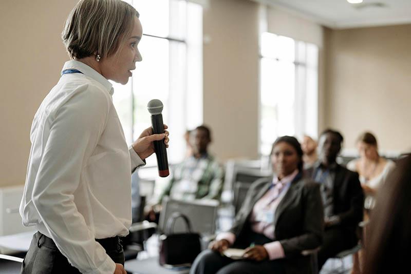 Person standing and presenting to room